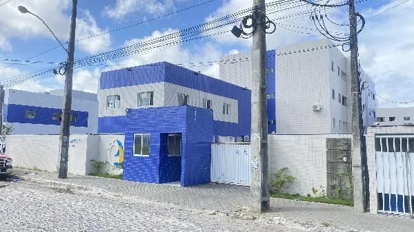 Apartamento com fachada azul em condomínio residencial no Gramame, Joao Pessoa