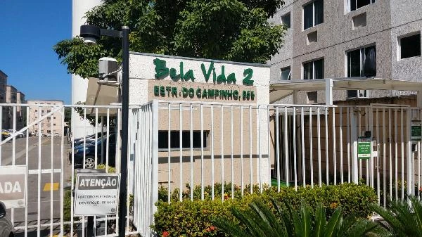 Apartamento em condomínio residencial Bela Vida 2 com portaria e fachada visível em dia ensolarado