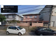 Apartamento com garagem box na frente de edificado simples em Santos